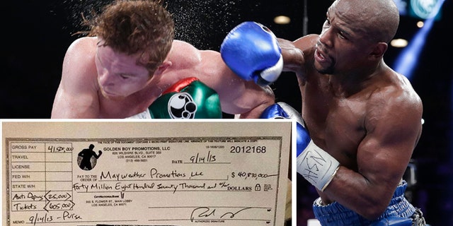 Floyd Mayweather Jr. and Canelo Alvarez during their fight on September 14, 2013.