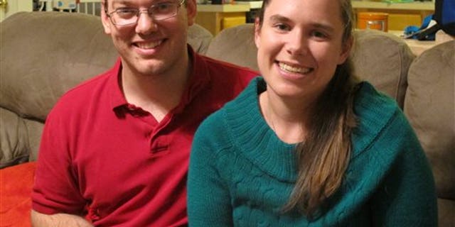 Nov. 25: Alyssa Riggan, who was the first in the United States to successfully receive a liver from a living donor 25 years ago, poses with her husband, Benjamin, in their home in Severn, Md.