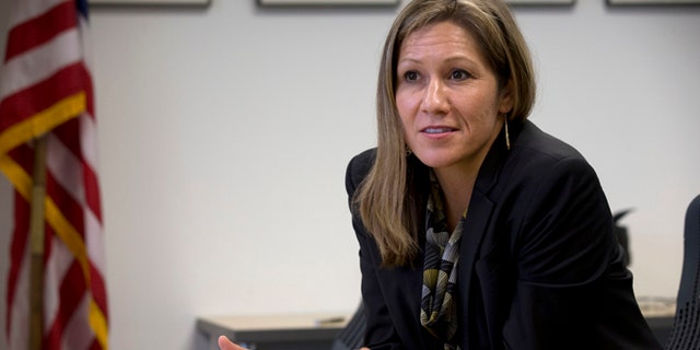 In this photo taken April 30, 2014, Amanda Renteria is interviewed in Washington.