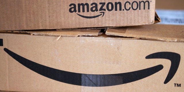 Two freshly delivered Amazon boxes are seen on a counter in Golden, Colorado August 27, 2014. With people increasingly accessing the Internet from smartphones and tablets, online companies ranging from social networks such as Facebook Inc to e-commerce companies like Amazon.com Inc have been investing heavily to develop their mobile platforms. REUTERS/Rick Wilking (UNITED STATES - Tags: BUSINESS SCIENCE TECHNOLOGY TELECOMS) - RTR44130