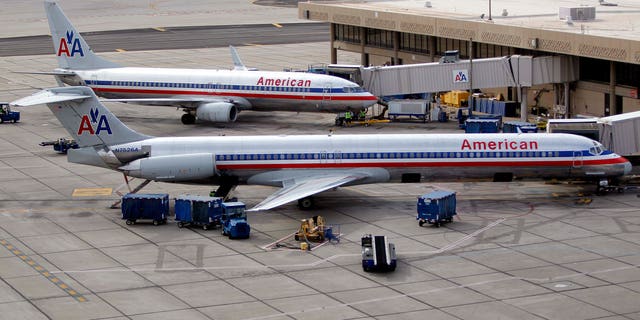 November 29: American Airlines' jets sit at the gate at Sky Harbor International Airport in Phoenix. American Airlines and its parent company are filing for Chapter 11 bankruptcy protection as they seek to cut costs and unload massive debt built up by years of high jet fuel prices and labor struggles.