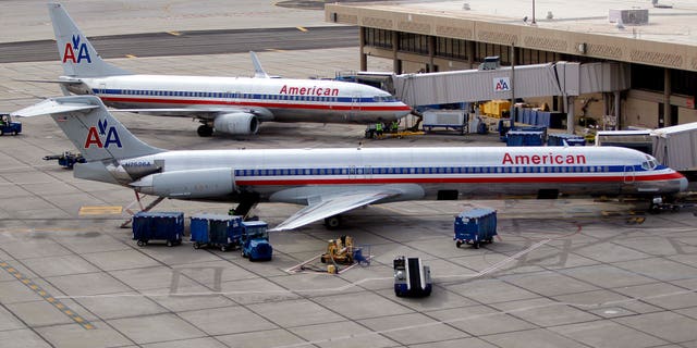 November 29: American Airlines' jets sit at the gate at Sky Harbor International Airport in Phoenix. American Airlines and its parent company are filing for Chapter 11 bankruptcy protection as they seek to cut costs and unload massive debt built up by years of high jet fuel prices and labor struggles.