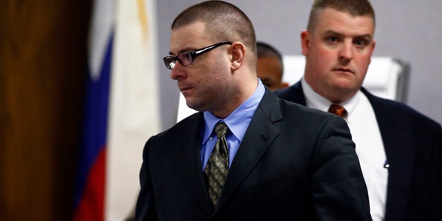 Feb. 18, 2015: Eddie Ray Routh, center, enters the courtroom following a break in his capital murder trial at the Erath County, Donald R. Jones Justice Center in Stephenville, Texas.