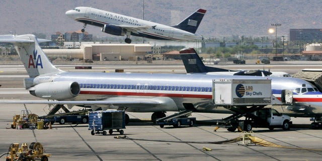 An American Airlines and a US Airways plane.