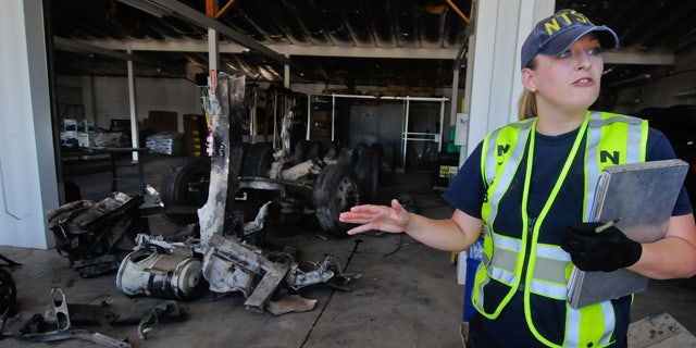 June 27: Jennifer Morrison, investigator from the NTSB, briefs the media on the wreckage recovery efforts of the 2008 Peterbilt 367 truck-tractor at the Nevada Department of Transportation maintenance facility in Fallon, Nev.