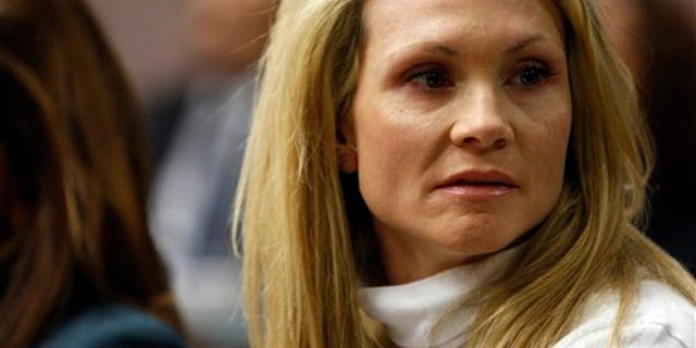 This Nov. 27, 2012 file photo shows former "Melrose Place" actress Amy Locane-Bovenizer in court as the jury in her trial returns a verdict in Somerville, N.J.