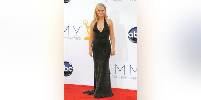 Actress Amy Poehler arrives at the 64th Primetime Emmy Awards at the Nokia Theatre on Sunday, Sept. 23, 2012, in Los Angeles. (Photo by Jordan Strauss/Invision/AP)