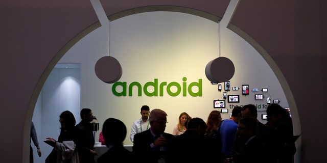 File photo - People visit an Android stand at the Mobile World Congress in Barcelona March 4, 2015.