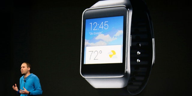 David Singleton, director of engineering for Android, announces a new Samsung Android Wear smartwatch during his keynote address at the Google I/O developers conference in San Francisco June 25, 2014.