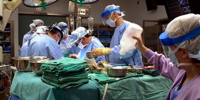 File photo of a heart transplant operation at the Cleveland Clinic in Cleveland.