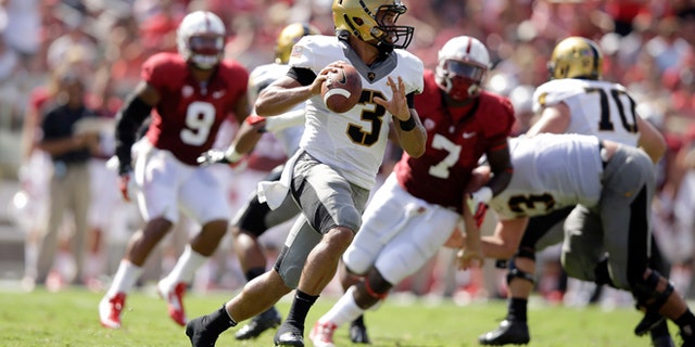 PALO ALTO, CA - SEPTEMBER 13: Angel Santiago #3 of the Army Black Knights looks to pass the ball against the Stanford Cardinal at Stanford Stadium on September 13, 2014 in Palo Alto, California. (Photo by Ezra Shaw/Getty Images)