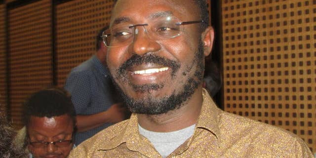 This photo taken May 11, 2014 shows Angolan journalist and human rights advocate, Rafael Marques de Morais, during a visit to Johannesburg, South Africa. Marques was last month found guilty of libel and defamation after publishing a 2011 book that alleged that a group of generals and three companies were linked to human rights abuses at diamond mines in Angola. (AP Photo/Simon Allison)