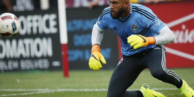 Colorado Rapids goalkeeper Tim Howard (1) warms up before the first half of a Major League Soccer match Monday, July 4, 2016, in Commerce City, Colo.