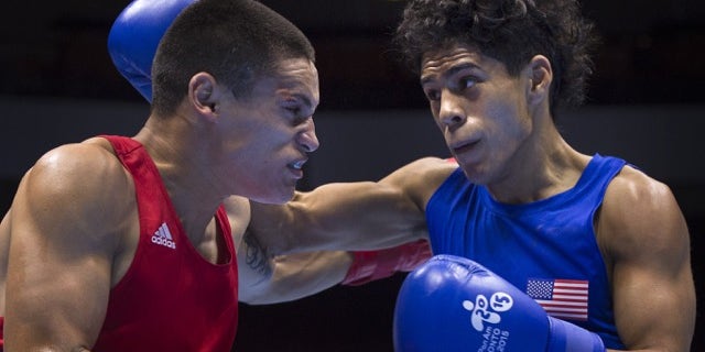 Antonio Vargas (R) in the Men's Fly (52kg) Semifinals Bout at the at the Pan American Games.