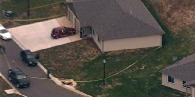 Nov. 30: This frame grab photo from a video provided by KSDK, TV-5, St. Louis, shows the scene in Bonne Terre, Mo., where four people were found dead. St. Francois County Coroner Jim Coplin says a man shot the other three people, then himself.