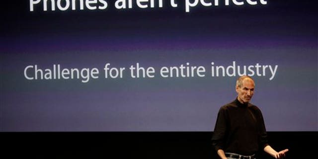 Apple CEO Steve Jobs talks about the Apple iPhone 4 at Apple headquarters in Cupertino, Calif., Friday, July 16, 2010.