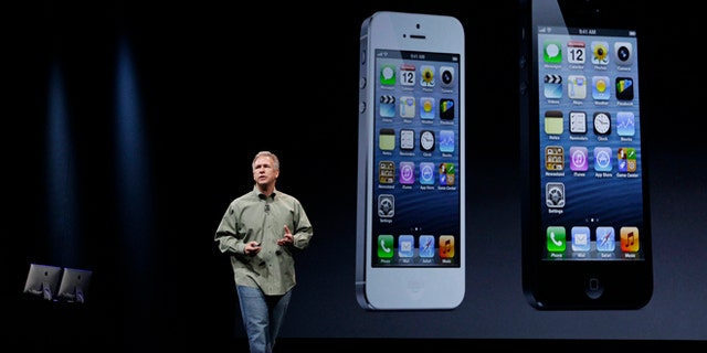 Sept. 12, 2012: Phil Schiller, Apple's senior vice president of worldwide marketing, speaks on stage during an introduction of the new iPhone 5 in San Francisco.
