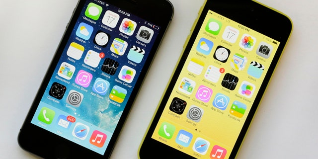 Sept. 17, 2013: The iPhone 5S, left, 5S offers a fingerprint sensor, a better camera and a faster processor, while the iPhone 5C, right, is largely last years iPhone 5 with a plastic back and a choice of five colors.