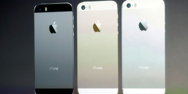 Sept. 10, 2013: Apple's senior vice president of worldwide product marketing Phil Schiller introduces the new iPhone 5s in Cupertino, Calif.