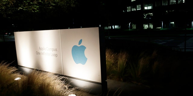 June 7, 2013: A sign displays the Apple logo outside of the company's headquarters in Cupertino, Calif.