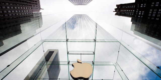 File photo - The Apple logo hangs in a glass enclosure above the 5th Ave Apple Store in New York, Sept. 20, 2012.