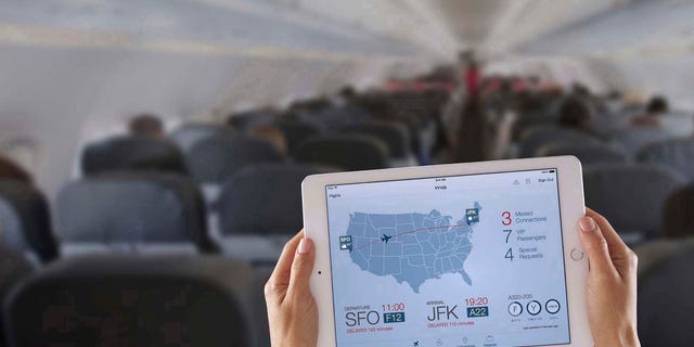 In this photo distributed for IBM: Apple and IBM announced the availability of the first made-for-business apps designed for iPhone and iPad business users on Dec. 10. The apps include Passenger+(pictured), which allows airline flight crews to offer personalized, in-flight services to passengers such as rebooking flights, accessing baggage information and providing special offers.