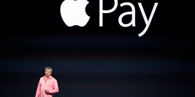 Eddy Cue, Apple's senior vice president of Internet Software and Service, introduces Apple Pay during an Apple event at the Flint Center in Cupertino, California, September 9.