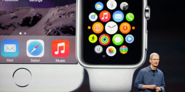 Apple CEO Tim Cook speaks during an Apple event announcing the iPhone 6 and the Apple Watch at the Flint Center in Cupertino, Calif., Sep. 9, 2014.