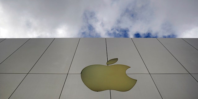 The Apple logo is displayed outside one of the company's stores.