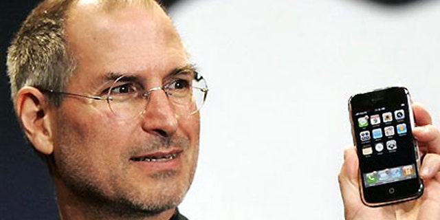 A new era dawns: Steve Jobs unveils the first iPhone in January 2007.