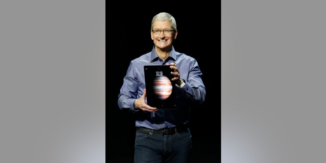 File photo - Apple CEO Tim Cook introduces the new iPad Pro during an Apple media event in San Francisco, Calif., Sept. 9, 2015.