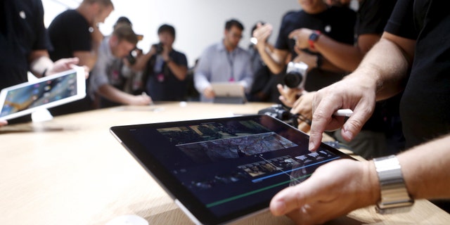 The new Apple iPad Pro is displayed during an Apple media event in San Francisco, Calif., Sept. 9, 2015.