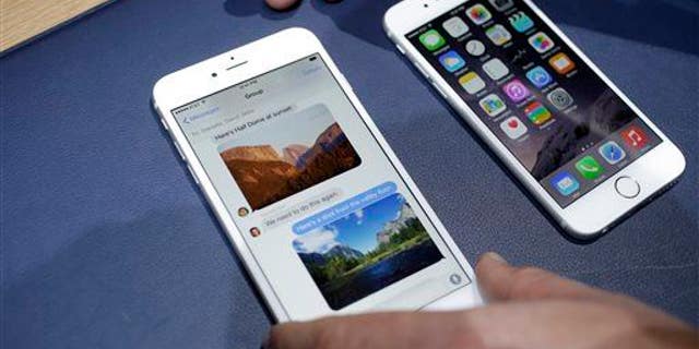 In this file photo, the iPhone 6 Plus, left, and iPhone 6 are displayed in Cupertino, Calif.