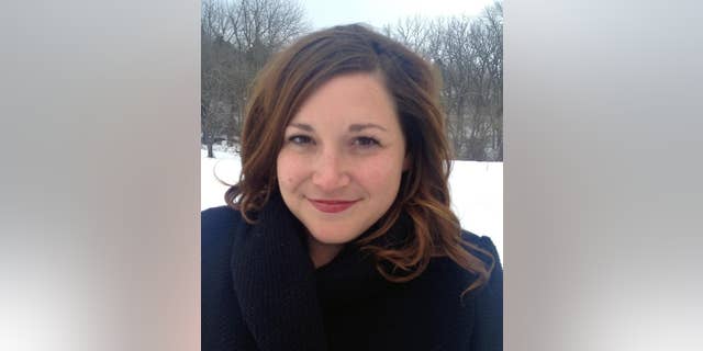 In this undated photo released by Jessie Burnett, Claire Galofaro poses for a photo. The Associated Press has named Claire Galofaro, a veteran newspaper reporter and Louisville native, as its administrative correspondent for Kentucky and Tennessee. Galofaro, 32, most recently worked at The Courier-Journal, where she covered criminal justice and social services. (AP Photo/Jessie Burnett)