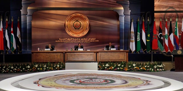 Egyptian President Abdel-Fattah el-Sissi, center, Arab League Secretary-General Nabil Elaraby, left, and Egyptian Foreign Minister Sameh Shukri, preside over a meeting of Arab heads of state, in Sharm el Sheik, South Sinai, Egypt, Saturday, March 28, 2015. El-Sissi endorsed a resolution adopted by Arab foreign ministers on Thursday for the creation of an Arab military force, saying the Arab world was currently facing unprecedented threats. He also described as inevitable the Saudi-led intervention in Yemen. (AP Photo/Ahmed Abdel Fatah, El Shorouk Newspaper)