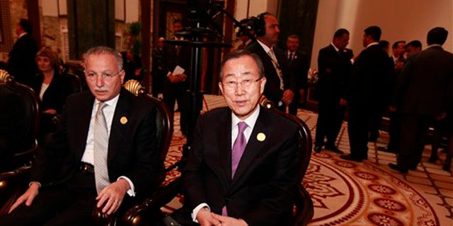 March 29, 2012: United Nations Secretary-General Ban Ki-moon, center, attends the Arab League summit in Baghdad, Iraq.