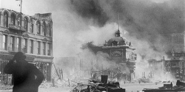 In this April 18, 1906 file picture, smoke rises from out-of-control fires following a powerful earthquake in San Francisco.