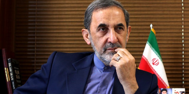 FILE - In this Sunday, Aug. 18, 2013, file photo, Ali Akbar Velayati, a top adviser to Iran's supreme leader Ayatollah Ali Khamenei, gives an interview to The Associated Press at his office, in Tehran, Iran. Velayati accused of masterminding Argentina's worst terrorist attack said Monday, May 18, 2015, that he is innocent and dismissed the accusations against him as baseless. The 1994 bombing of the AMIA Jewish community center that killed 85 people remains unsolved. Former Iranian officials have been on an Interpol capture list for years, but Argentine prosecutors have never been able to question them, and Iran has long denied any role in the bombing. (AP Photo/Ebrahim Noroozi, File)