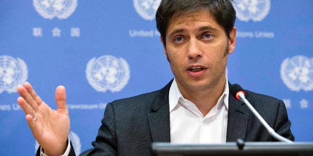 Argentine Economic Minister Axel Kicillof speaks during a news conference at United Nations headquarters, Wednesday, June 25, 2014. The winners of a decade-long debt battle asked a U.S. judge on Tuesday to deny Argentina's request for more negotiating time to avoid a catastrophic default. (AP Photo/John Minchillo)
