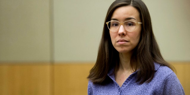 --FILE--In this Thursday, Feb. 12, 2015, file photo, Jodi Arias stands for the jury during her sentencing retrial at Maricopa County Superior Court, in Phoenix. Arias was spared the death penalty Thursday after jurors deadlocked on her punishment for killing her lover in 2008, meaning her sentence will be at most life in prison.(AP Photo/The Arizona Republic, Cheryl Evans, Pool)