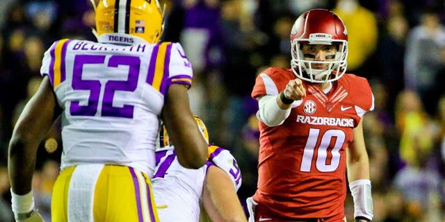 Nov 14, 2015; Baton Rouge, LA, USA; Arkansas Razorbacks quarterback Brandon Allen (10) against the LSU Tigers during the second quarter of a game at Tiger Stadium. Mandatory Credit: Derick E. Hingle-USA TODAY Sports