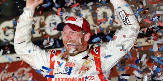 FILE - In this Feb. 23, 2014 file photo, Dale Earnhardt Jr. celebrates in Victory Lane after winning the NASCAR Daytona 500 Sprint Cup series auto race at Daytona International Speedway in Daytona Beach, Fla. As NASCAR heads West for a two-race swing through Phoenix and Las Vegas, the challenge becomes duplicating the Daytona 500 so that the remaining 36 events are half as exciting. (AP Photo/Terry Renna, File)