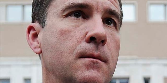 April 17, 2015: A. Ryan McGuigan, attorney for Robert Gentile, stands outside federal court, in Hartford, Conn.