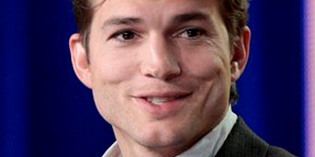 FILE - Ashton Kutcher speaks during the panel discussion for the sitcom "Two and a Half Men" at the Television Critics Association Winter Press Tour for CBS, the CW and Showtime in Pasadena, Calif.