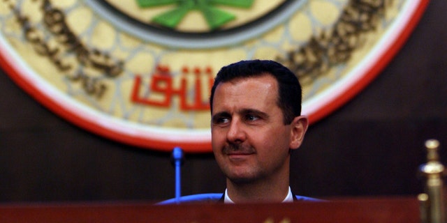Syrian President Bashar al-Assad heads the closing of the two-day Arab summit on March 30, 2008 in Damascus, Syria. (Photo by Salah Malkawi/ Getty Images)