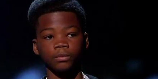 Dec. 1, 2011: Astro learns he has been eliminated off the X Factor Thursday night.