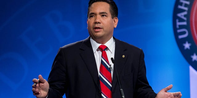 FILE - In this Oct. 1, 2014 file photo, Sean Reyes speaks during his debate with Charles Stormont as the Utah Attorney General hopefuls debate at KBYU Studios in Provo, Utah. Reyes says he secretly traveled to South America to play a role in a sex-trafficking sting operation in order to help fight the crime before victims end up in Utah. Reyes spoke this week about the trip to Colombia in October, where he pretended to be a bodyguard and Spanish-speaking translator for businessmen seeking children for a sex party. (AP Photo/The Salt Lake Tribune, Trent Nelson, Pool)