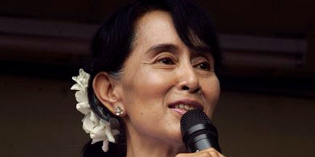 April 2, 2012: Myanmar pro-democracy leader Aung San Suu Kyi talks to supporters at the headquarters of her National League for Democracy party in Yangon, Myanmar.