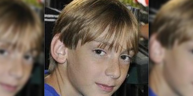 This photo of gunman Austin Wyatt Rollins, 17, was posted to his Facebook in May 2014.