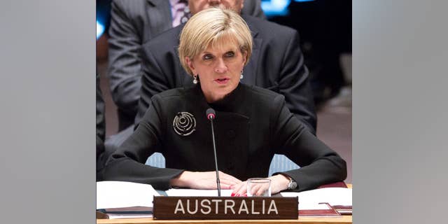 FILE - In this Sept. 19, 2014 file photo, Australian Foreign Minister Julie Bishop addresses a meeting of the U.N. Security Council on Iraq at the United Nations headquarters. Australia will continue to directly pay for climate change adaptation in vulnerable South Pacific island nations through its aid budget rather than donate to a U.N. Green Climate Fund designed for the same purpose, Bishop said Friday, Dec. 5, ahead of climate talks in Peru. (AP Photo/Bebeto Matthews, File)